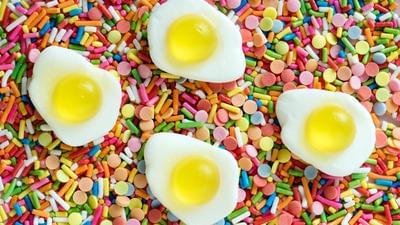 Candy eggs lying on a pile of candy